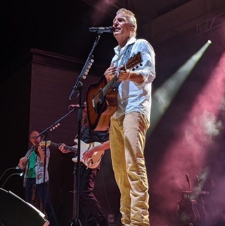 Kevin Costner during one of his music concert tours. 